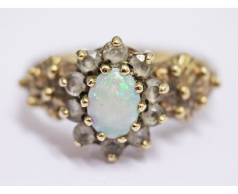 A 9ct gold opal ring, gross wt. 3.5g, size R