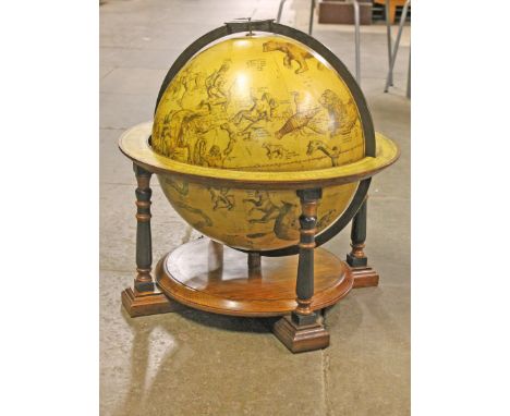 A contemporary celestial globe by Greaves &amp; Thomas with oak and ebonised frame. H50cm