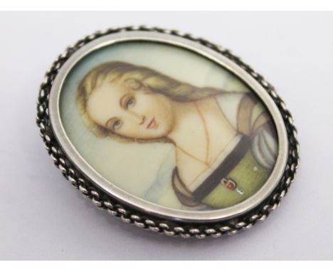 A miniature portrait within a silver frame marked '800', 2.9cm x 3.6cm