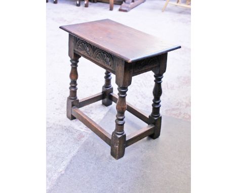 An oak joint stool. H46cm