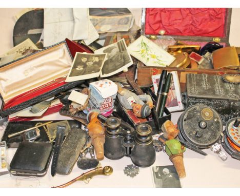 A mixed and varied lot to include pens, fishing reels, vintage compacts, whistles, Nazi photographs, opera glasses, nude play