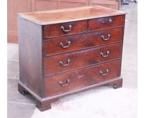 A George III mahogany chest of drawers with brass handles and bracket feet. W109cm D53cm H90cm
