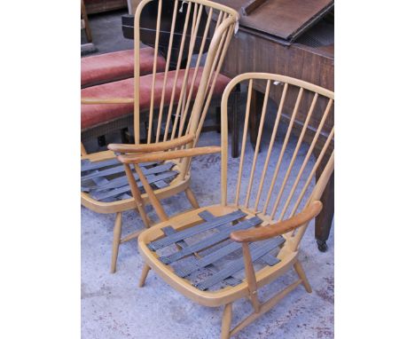 Two Ercol light beech armchairs
