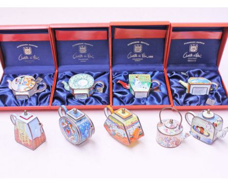 A group of four Charlotte Di Vita boxed teapots  with certificates and another five similar. Condition - one with dents and l