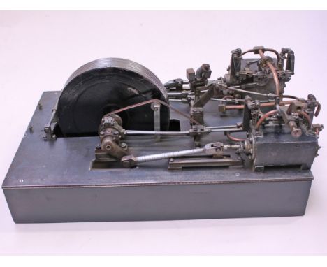 A twin cylinder stationary model mill engine, length 42.5cm. Condition - appears in good order and complete but sold as seen.