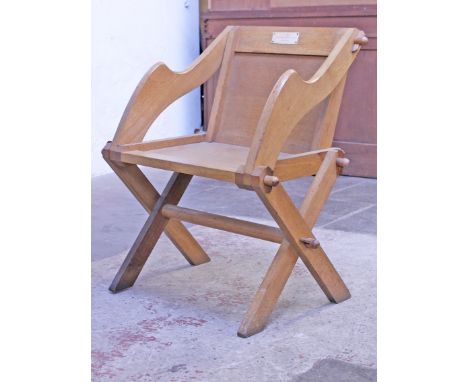 A light oak Abbot's chair. W70cm D54cm H82cm