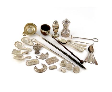λ A mixed lot of old Sheffield plated items, comprising: two sugar crushers, a pepper pot, five caddy spoons, four teaspoons,