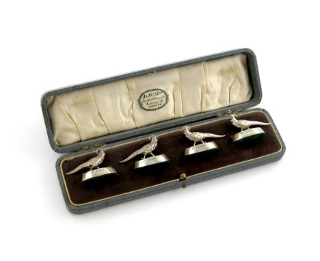 A set of four novelty silver menu card holders, by S. Mordan and Co,  retailed by The Army and Navy C .S. Limited, London 192