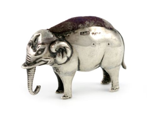 An Edwardian novelty silver elephant pin cushion, by Charles and Cohen, Birmingham 1906, modelled in a standing position, len