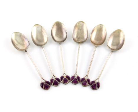 By James Fenton, a set of six Edwardian Arts and Crafts silver and enamel teaspoons, Birmingham 1909, oval bowls, fluted stem