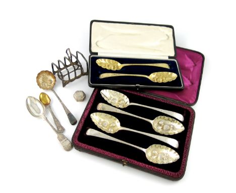 A mixed lot of silver items, various dates and makers, comprising: a cased set of four berry spoons, gilded bowls, a cased pa