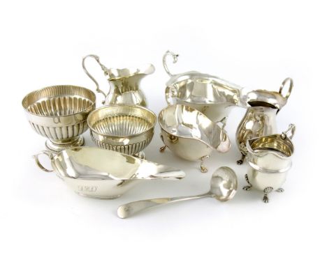 A mixed lot of silver items, various dates and makers, comprising: a silver sauce boat, Birmingham 1915, a George III sauce l