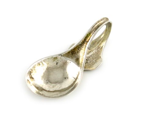 By Omar Ramsden, an Arts and Crafts silver caddy spoon, London 1927, spot hammered fig-shaped bowl, the spread scroll handle 