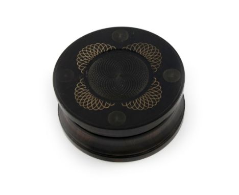 A late 19th century treen snuff box, circular form, carved decoration, diameter 7.5cm.
