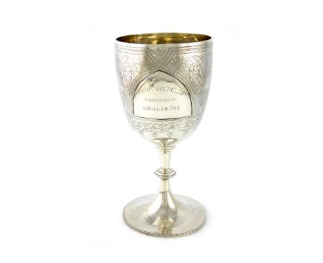 A Victorian silver goblet, by E. Hutton, London 1883, urn shaped bowl, engraved decoration inscribed 'Savoy Golf Club, presen