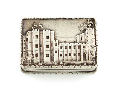 A Victorian silver 'castle-top' vinaigrette, Kenilworth Castle, by Nathaniel Mills, Birmingham 1837, rectangular form, the hi