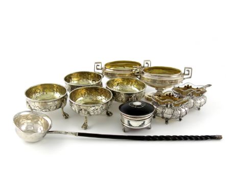 λ A mixed lot of silver items, various dates and makers, comprising: a set of four George III salt cellars, with later decora