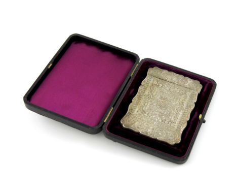 A Victorian silver card case, by Edward Smith, Birmingham 1858, rectangular form, engraved decoration, one side engraved with