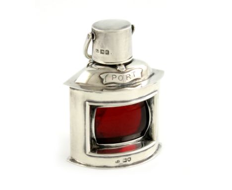 An Edwardian novelty silver ship's port lamp, by S. Jacobs, London 1902, triangular segment form, with a red panel under glas