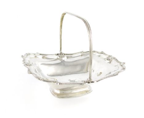 A George III silver swing-handled cake basket, by R and S Hennell, London 1809, shaped rectangular form, gadroon and shell bo