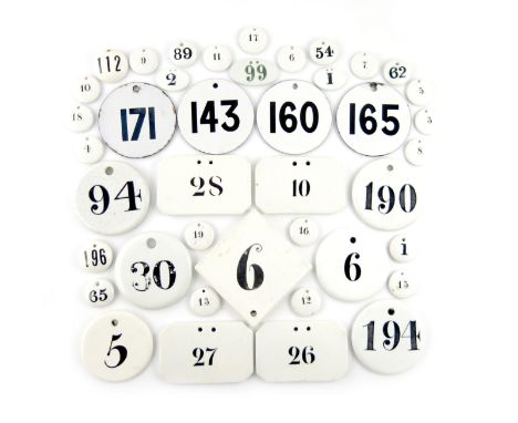A collection of numbered ceramic bin labels, some by Wedgwood, various designs, plus some enamelled examples. (41)