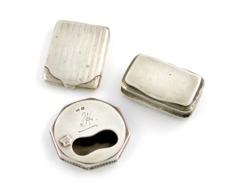 A silver snuff box, by Walker and Hall, Sheffield 1944, octagonal form, with a revolving cover with a leaf thumb-piece, initi