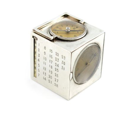 λ A French silver clock compendium, retailed by Tiffany and Co, Paris, circa 1920, cube form, the four sides with clock, perp