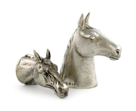 A modern novelty silver cigarette lighter, by R. Comyns, London 1970, modelled as a horse's head, the underside with a chrome