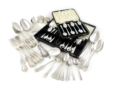 A mixed lot, comprising silver items: five tablespoons, a dessert fork, two napkin rings, a bangle, a set of six teaspoons, L