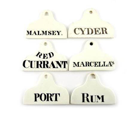 A collection of six 19th century ceramic bin labels, arched rounded rectangular form, titled in black 'RED CURRANT', 'CYDER',