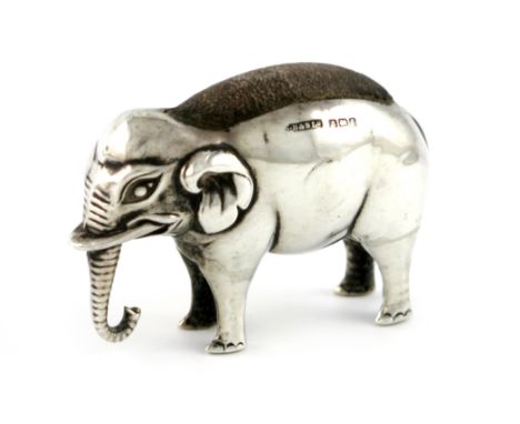 An Edwardian novelty silver elephant pin cushion, by S. Blanckensee and Sons Limited, Birmingham 1906, modelled in a standing