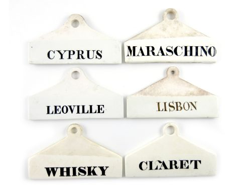 A collection of six 19th century ceramic bin labels, some by Wedgwood, Minton and Farrow and Jackson, arched rectangular form