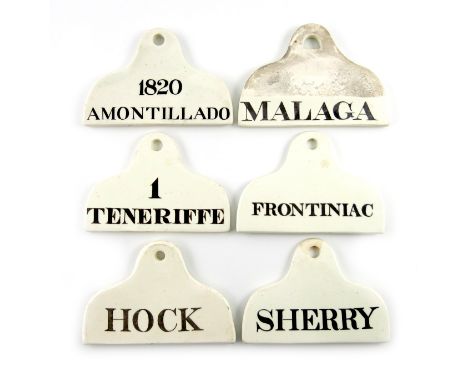 A collection of six 19th century ceramic bin labels, some by Copeland, arched rounded rectangular form, titled in black 'MALA