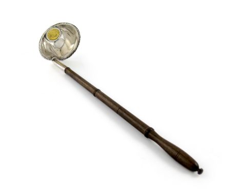 A modern silver punch ladle, by T.G and S, London 1981, tapering circular spot-hammered bowl, rope-twist border, the base set
