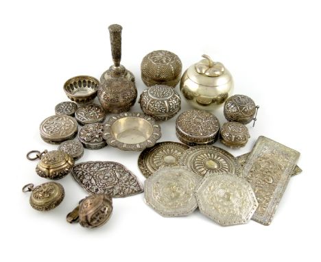 A mixed lot of Indonesian silver items, chased foliate decoration on matted backgrounds, comprising: twelve boxes, seven cush