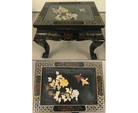 A small Chinese black lacquer side table with natural stone decoration of birds &amp; flowers in relief.  Mother of pearl inl