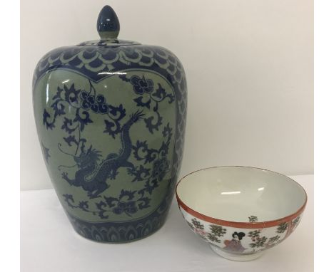 A vintage Chinese lidded jar with finial top and dragon decoration.  Together with a Japanese porcelain decorated bowl. Jar a