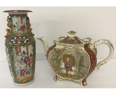 A late 19th century ornamental teapot together with an oriental Famille Rose style vase.  The teapot is brown &amp; cream dec