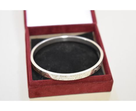 A silver bangle, stamped 'Tiffany &amp; Co',&nbsp;925, 34g. 