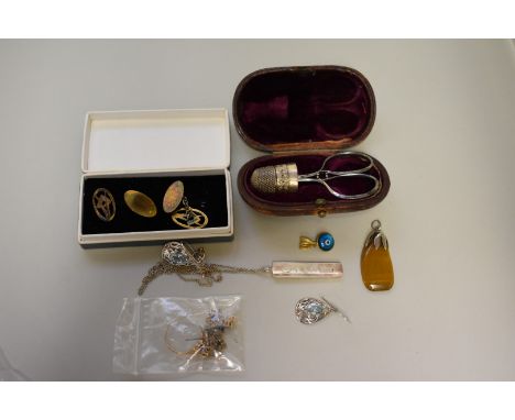 A Tiffany &amp; Co silver ingot pendant,&nbsp;on fine chain; together with an unmarked amethyst ring; a pair of silver gilt M