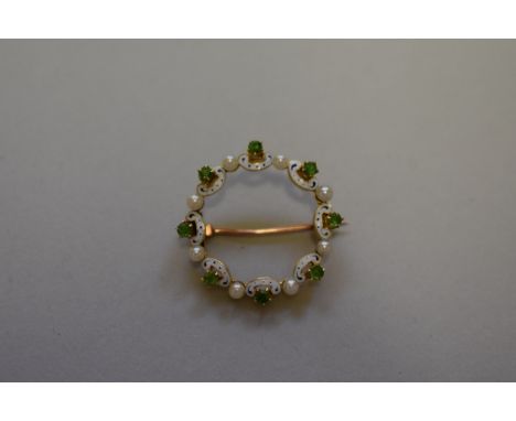 A demantoid garnet&nbsp;and pearl&nbsp;gold brooch,&nbsp;having enamel decoration, stamped 15ct, 3.3g total weight. 