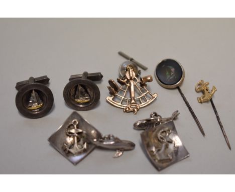 A small selection of nautical themed unmarked cufflinks and tie pins. 