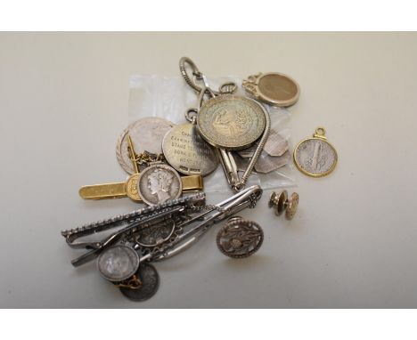 A pair of silver engine turned cufflinks; together with an Iona silver tie stud; two silver tie clips, etc. (17) 