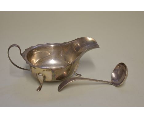 A silver sauce boat and ladle,&nbsp;by&nbsp;Thomas Turner &amp; Co,&nbsp;Sheffield 1933/4, 134g, 