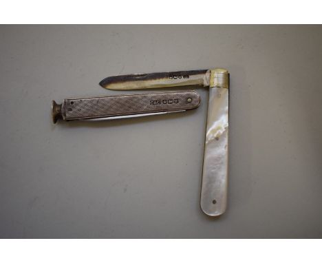 A silver engine turned smokers knife; together with a silver bladed mother of pearl penknife. (2) 