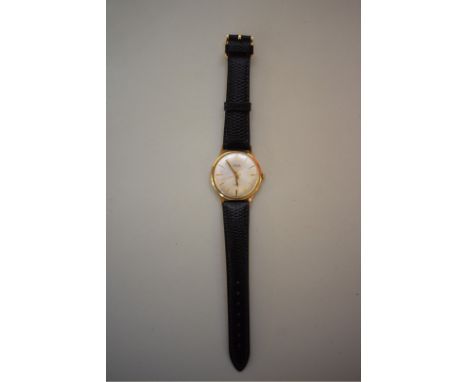 A vintage Avia 9ct yellow gold manual wind wristwatch, 32mm, ref 73, on replacement Hirsch leather strap. 