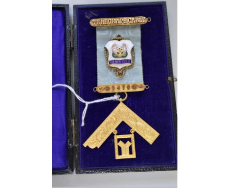 A cased Masonic gold and enamel medal, hallmarked 375 in places, for the Telegraph Cable Lodge, No.2470. 