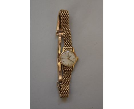 A vintage Omega 9ct gold ladies manual wind wristwatch, 19mm, ref 620, weight without movement and glass 25g. 