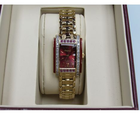 An Ingersoll ruby and diamond set dress watch, boxed with paperwork