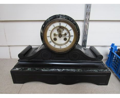 A marble mantel clock on plinth base with Roman enamel chapter ring, 8 day movement and visible escapement, 27.5cm high